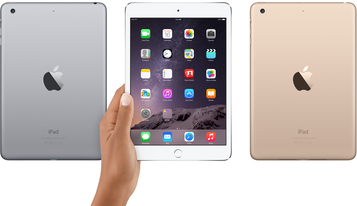 At the left part of the image is rear view of a gray iPad mini 3 at the left, in the middle is front view of an iPad mini 3 with a hand holding the edge, at the right is rear view of a gold iPad mini 3.